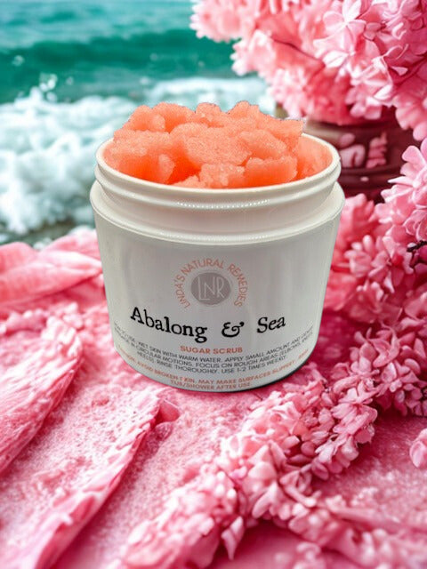 A jar of Abalone and Sea Emulsified Sugar Scrub, a fresh-scented creamy exfoliant for smooth, hydrated skin.