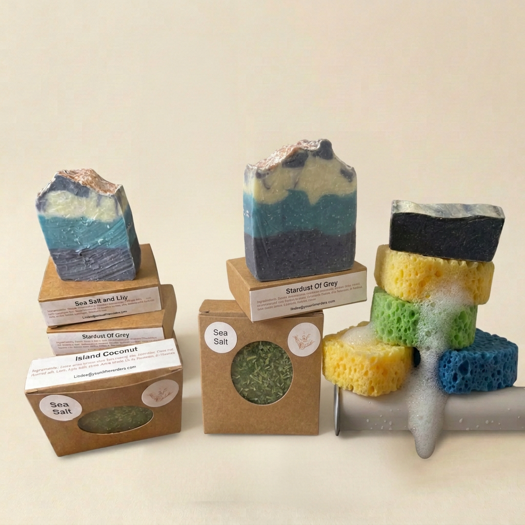 Larger soaps and soapy sponges arranged closer together on ivory