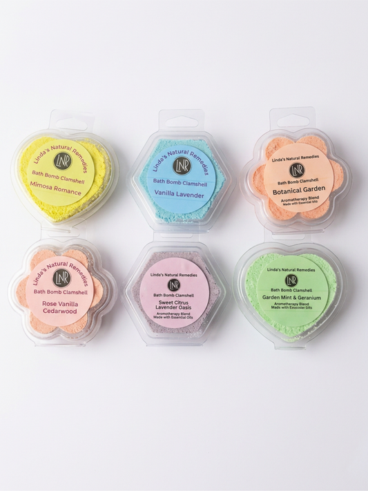 Set of six bath bomb containers with colorful lids on a white background