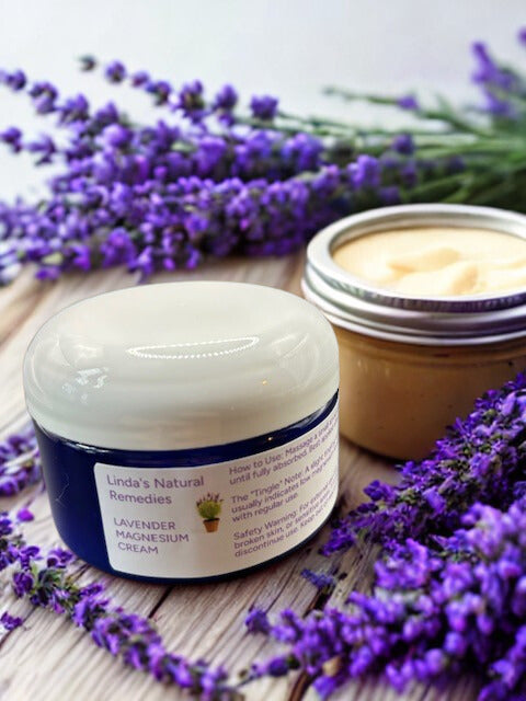 Artisan Lavender Magnesium Cream in a cobalt blue jar, made with Zechstein minerals by Linda’s Natural Remedies.