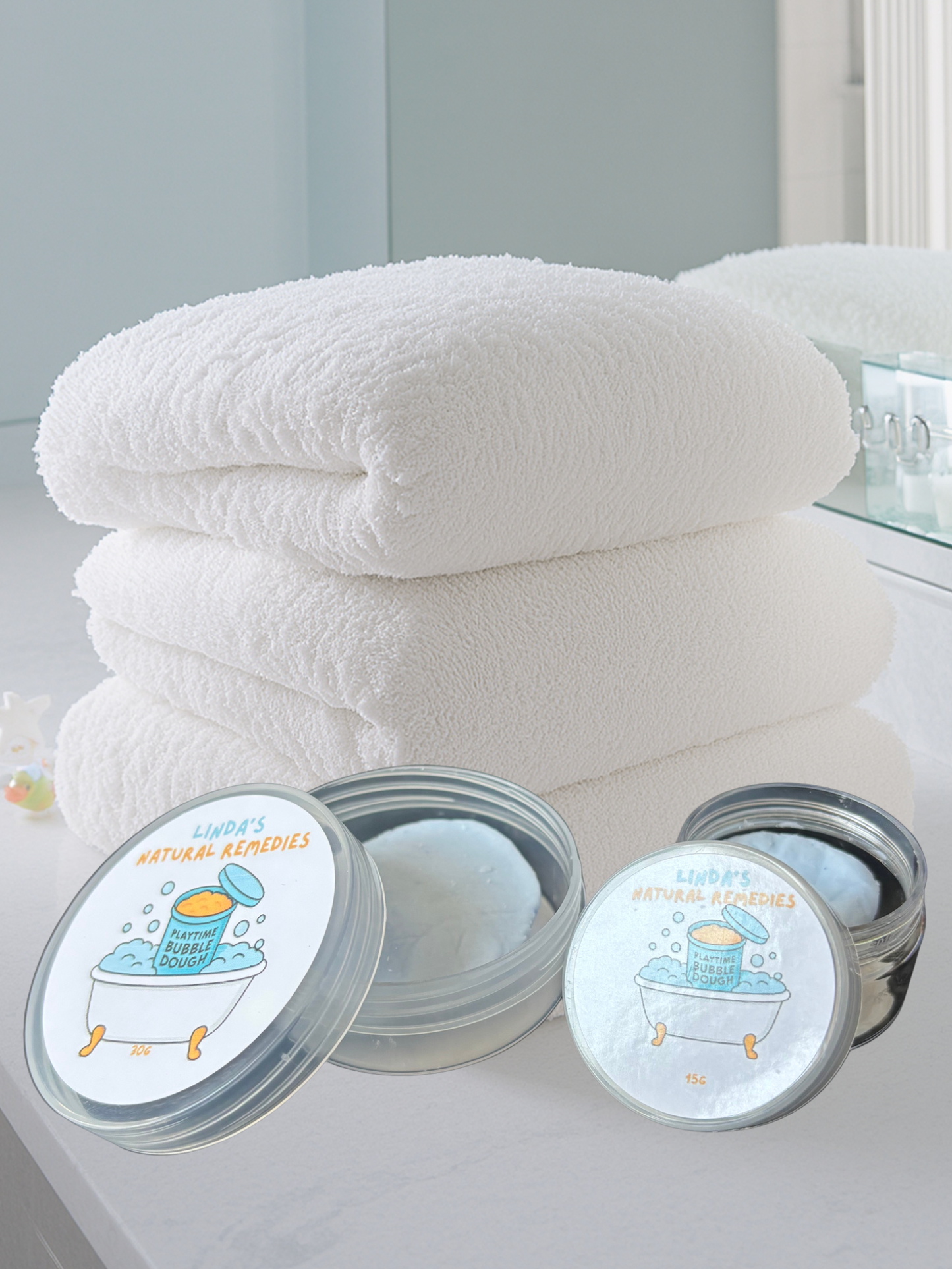 Light blue Blue Playtime Bubble Dough on white towel.