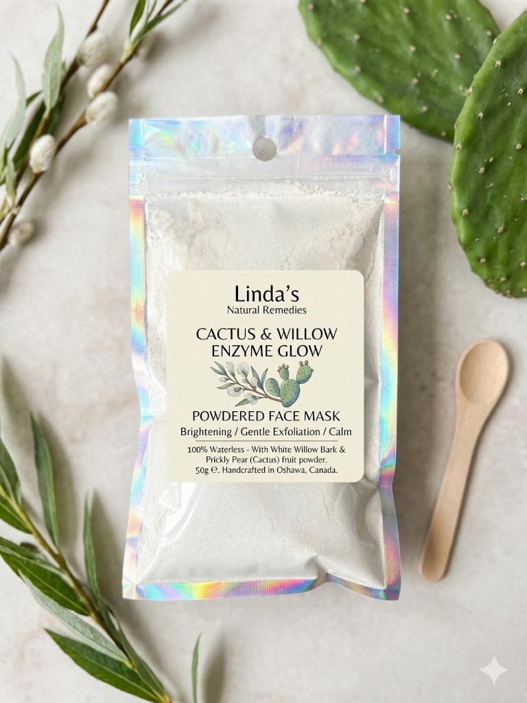 Powdered face mask package labeled 'Linda's Cactus & Willow Enzyme Glow' on a neutral background with green leaves.