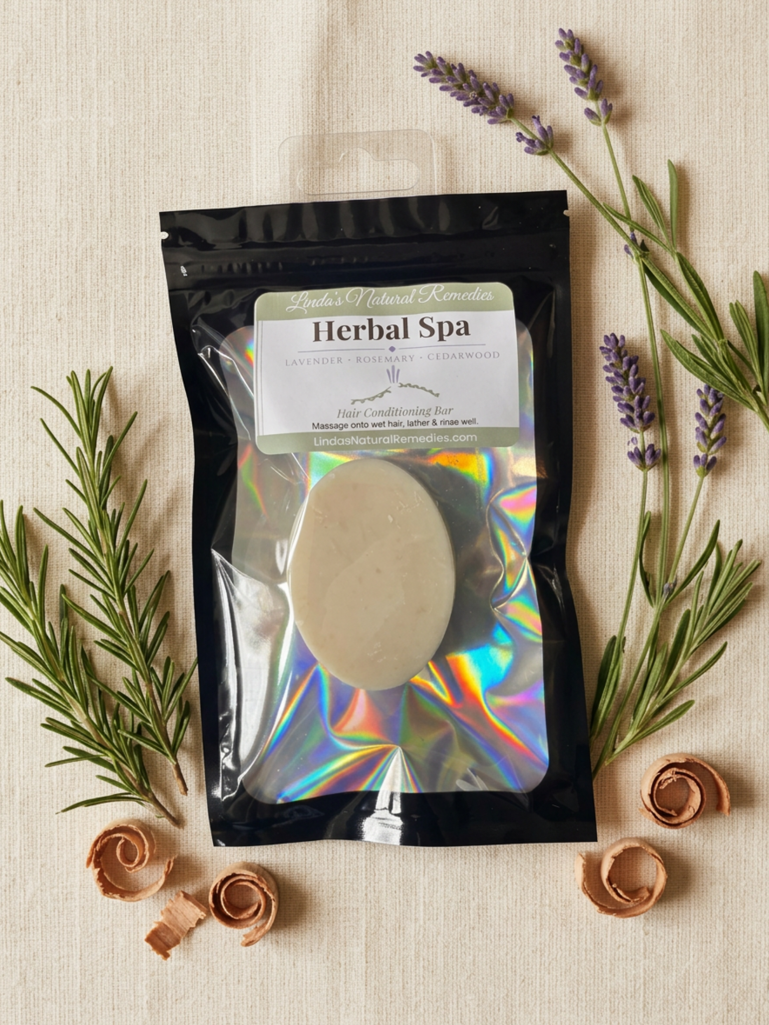 Herbal Spa product packaging with lavender and rosemary on a beige background