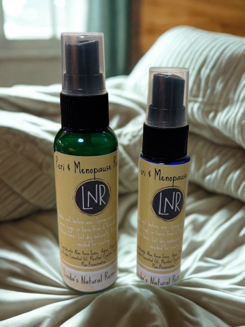 A coloured fine-mist spray bottle of Peri & Menopause Relief cooling mist, available in 30ml and 60ml sizes, featuring lavender and aloe vera.