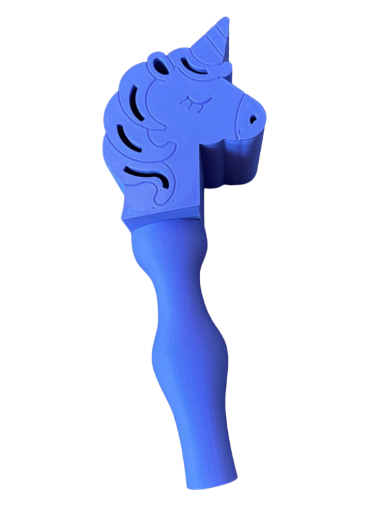 Unicorn wand on white surface.