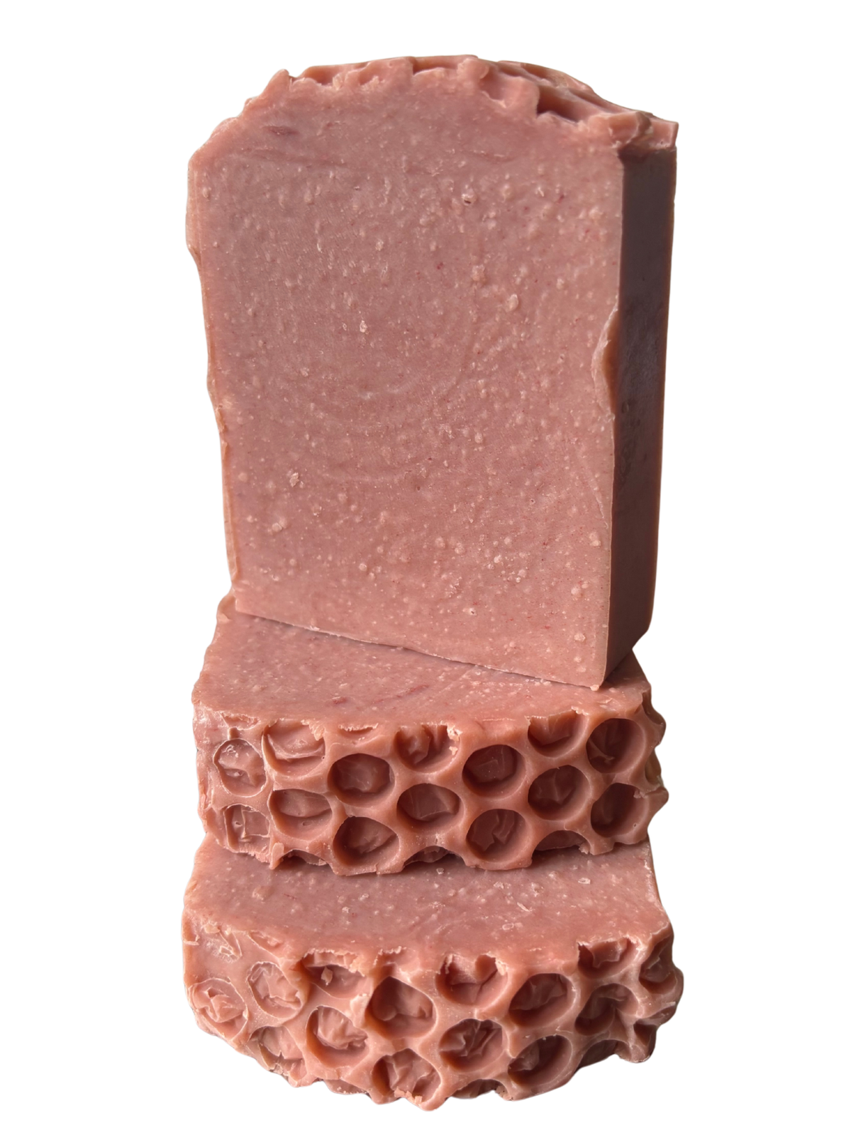 3 one-of-a-kind soaps stacks with a white background.