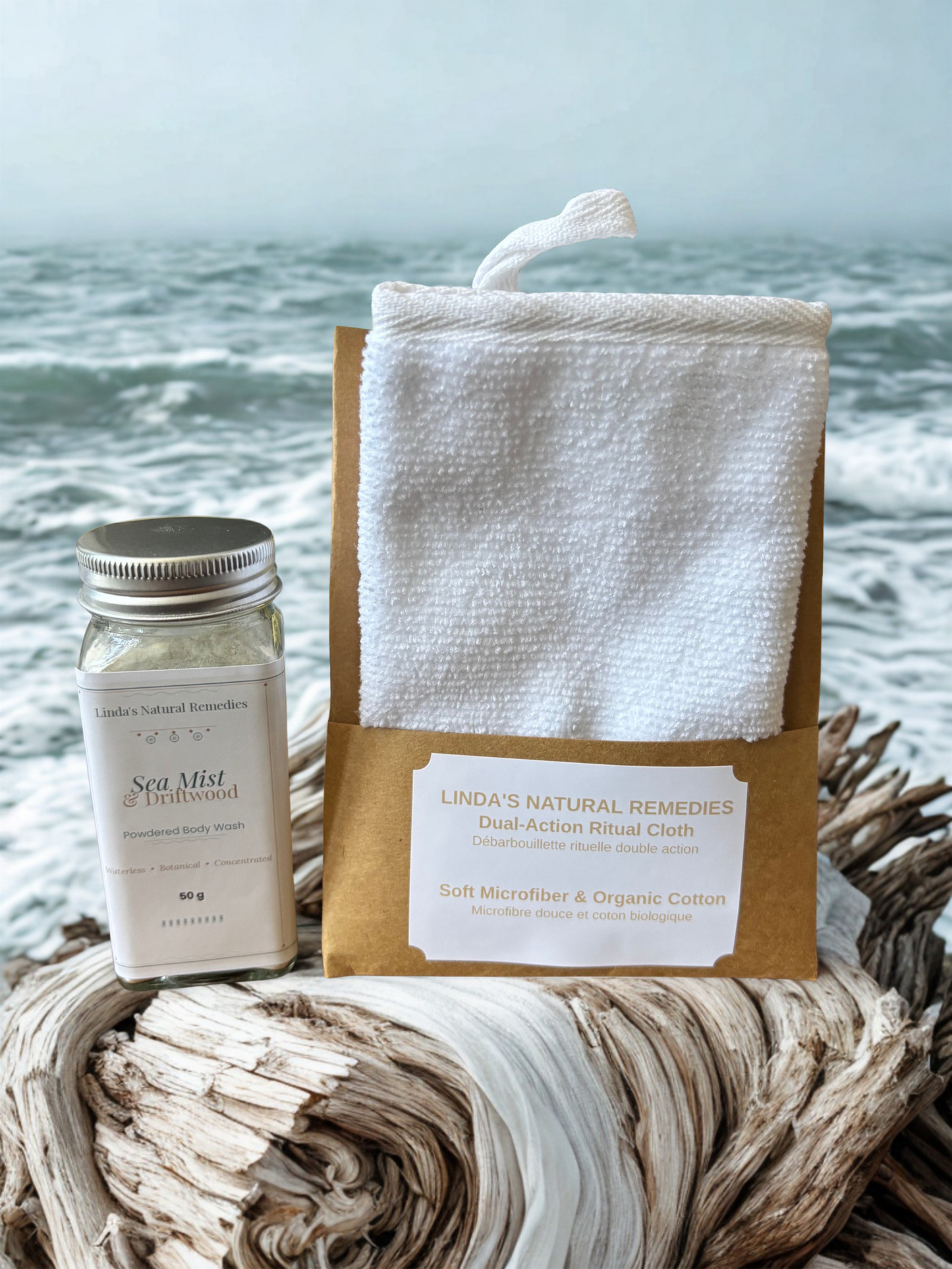 Linda's Natural Remedies Sea Mist Driftwood waterless body wash in a glass shaker jar with a Hiraya dual-action ritual cloth.