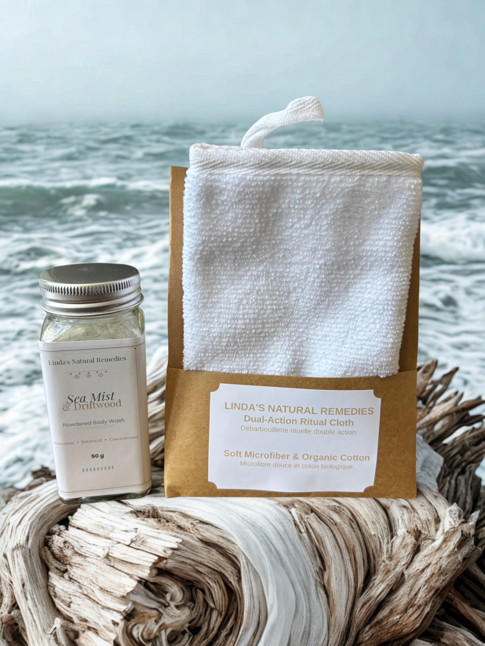 Linda's Natural Remedies Sea Mist Driftwood waterless body wash in a glass shaker jar with a Hiraya dual-action ritual cloth.