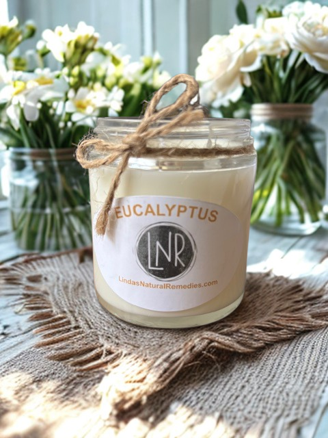 A hand-poured Eucalyptus soy candle in a glass jar with a matte label, designed for a clean-burning and refreshing home ambiance.