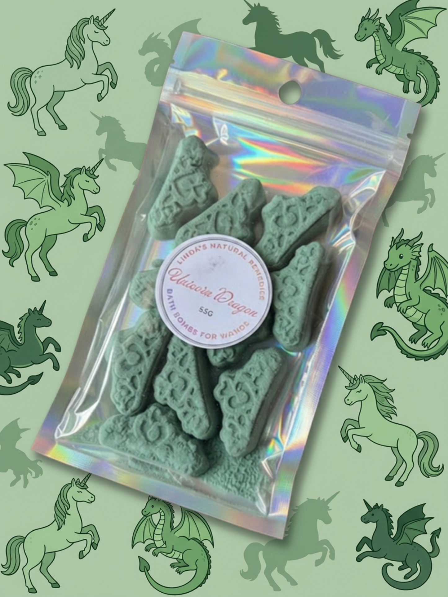 Unicorn dragon scented Tiera with unicorns in the background in green
