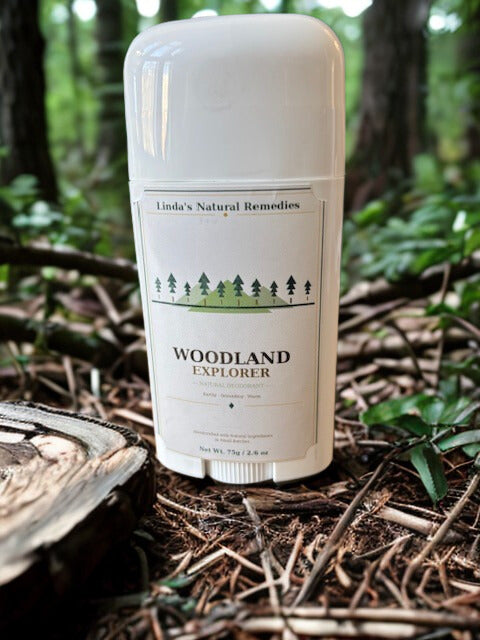 Woodland Explorer natural deodorant with earthy Cedarwood, Cypress, and Vetiver essential oils.
