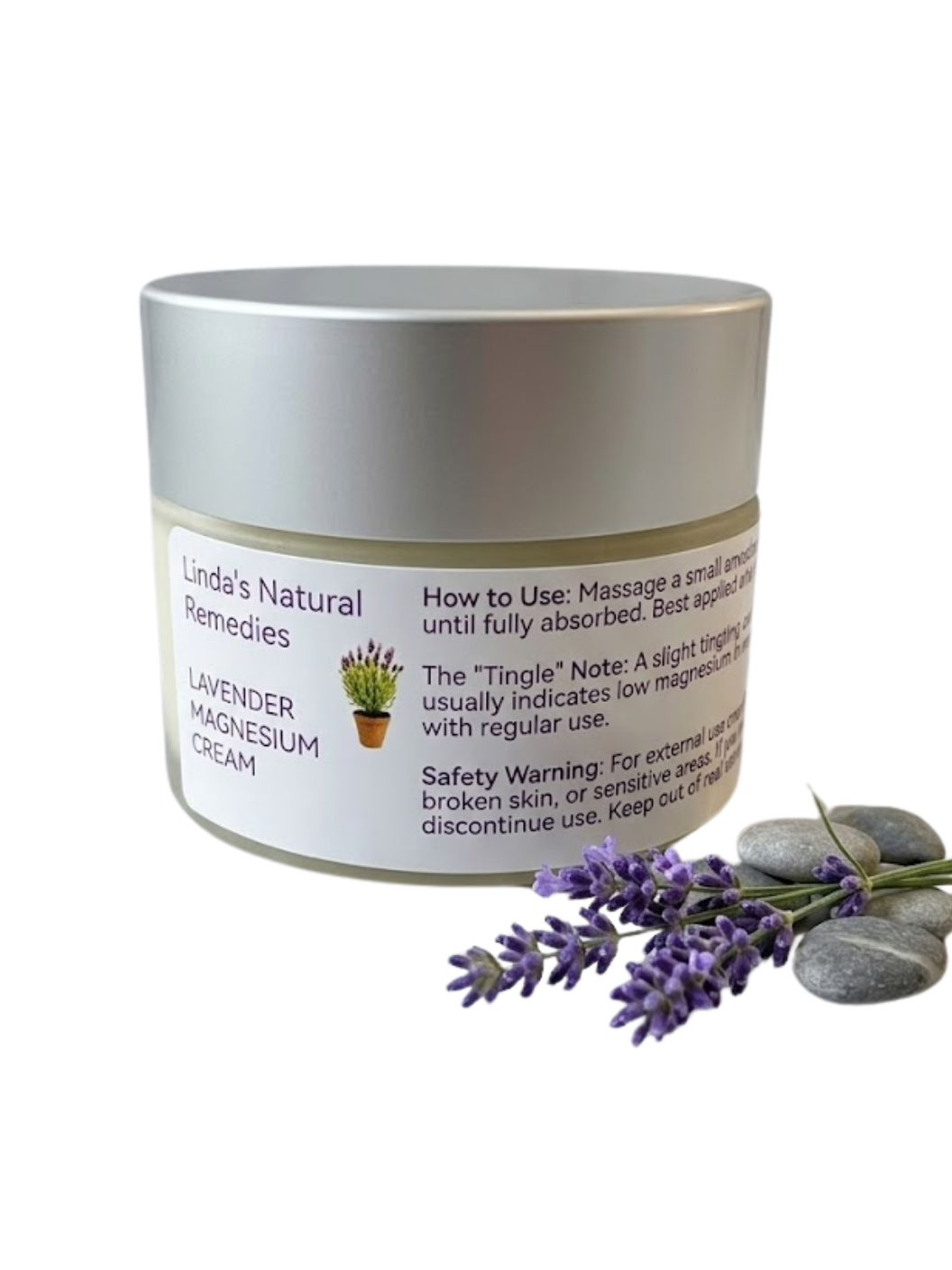 Linda's Natural Remedies Lavender Magnesium Cream jar with lavender flowers and stones on a white background