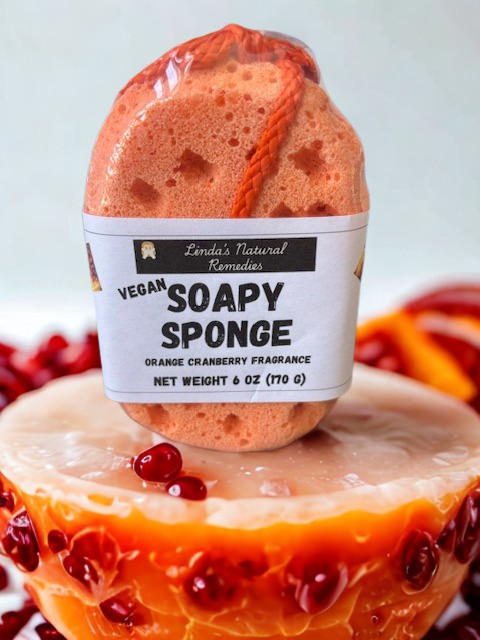 Zesty Orange Cranberry fragrance luxury soapy sponge with vibrant mica color.
